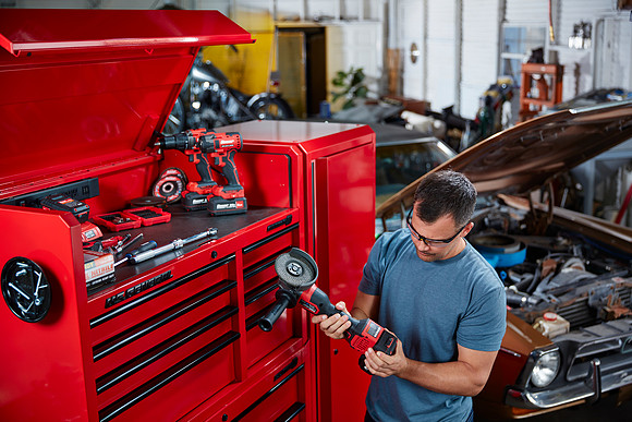 Garage location with red tool box and power tools